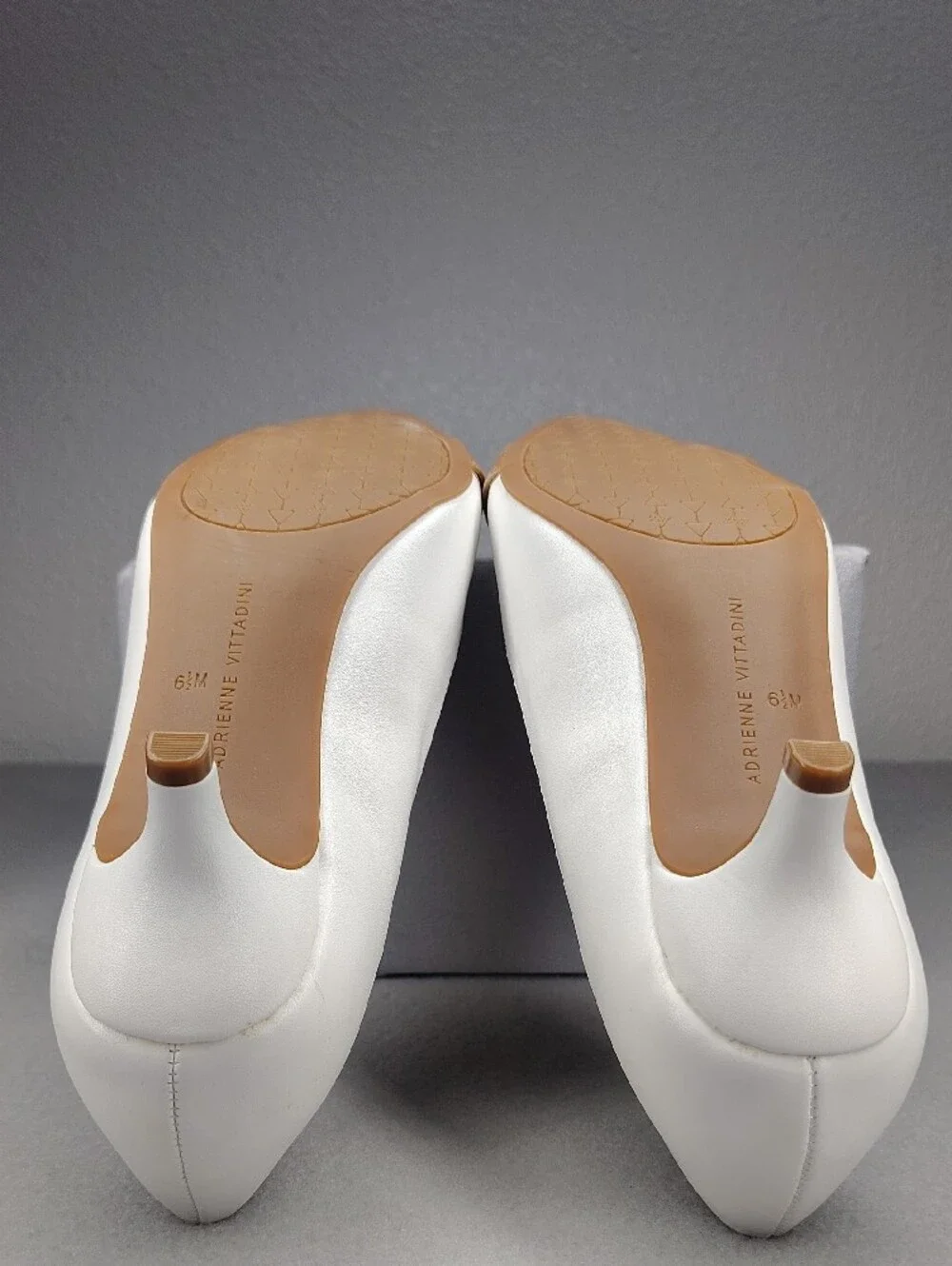 Adrienne Vittadini White Kitten Heels Rose Gold Accents Holding Gold Chain